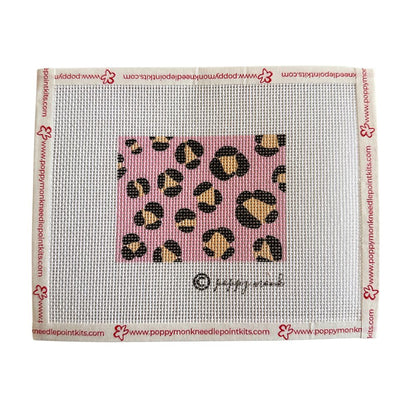 Leopard print needlepoint canvas on a white background with brand logo.