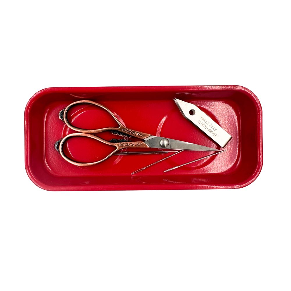 Red magnet tray with tools inside