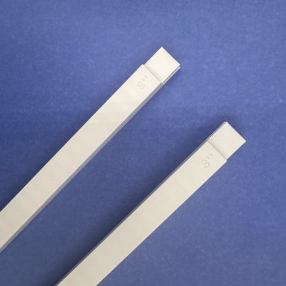 Two white 8 inch plastic mini stretcher bars