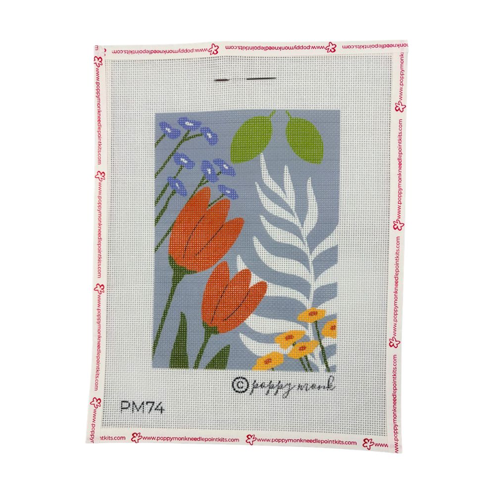 Floral needlepoint design on a gray background