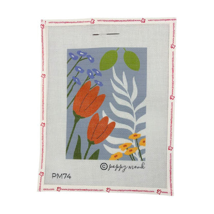 Floral needlepoint design on a gray background