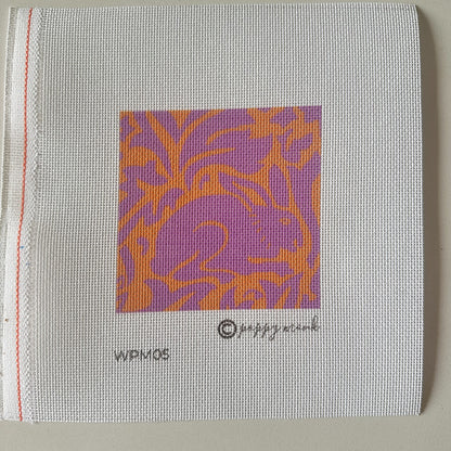 rabbit needlepoint design in pink and orange