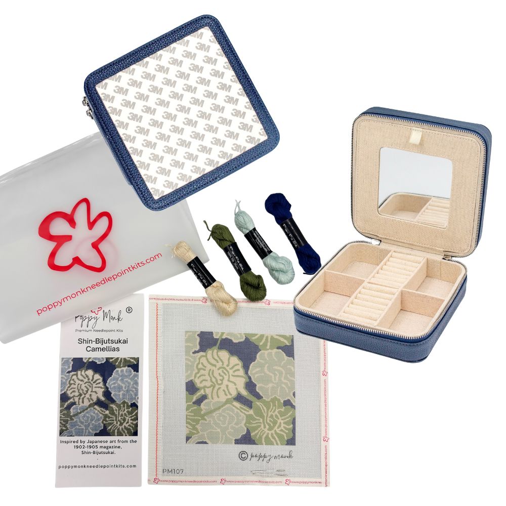Floral needlepoint kit with a navy jewelry box