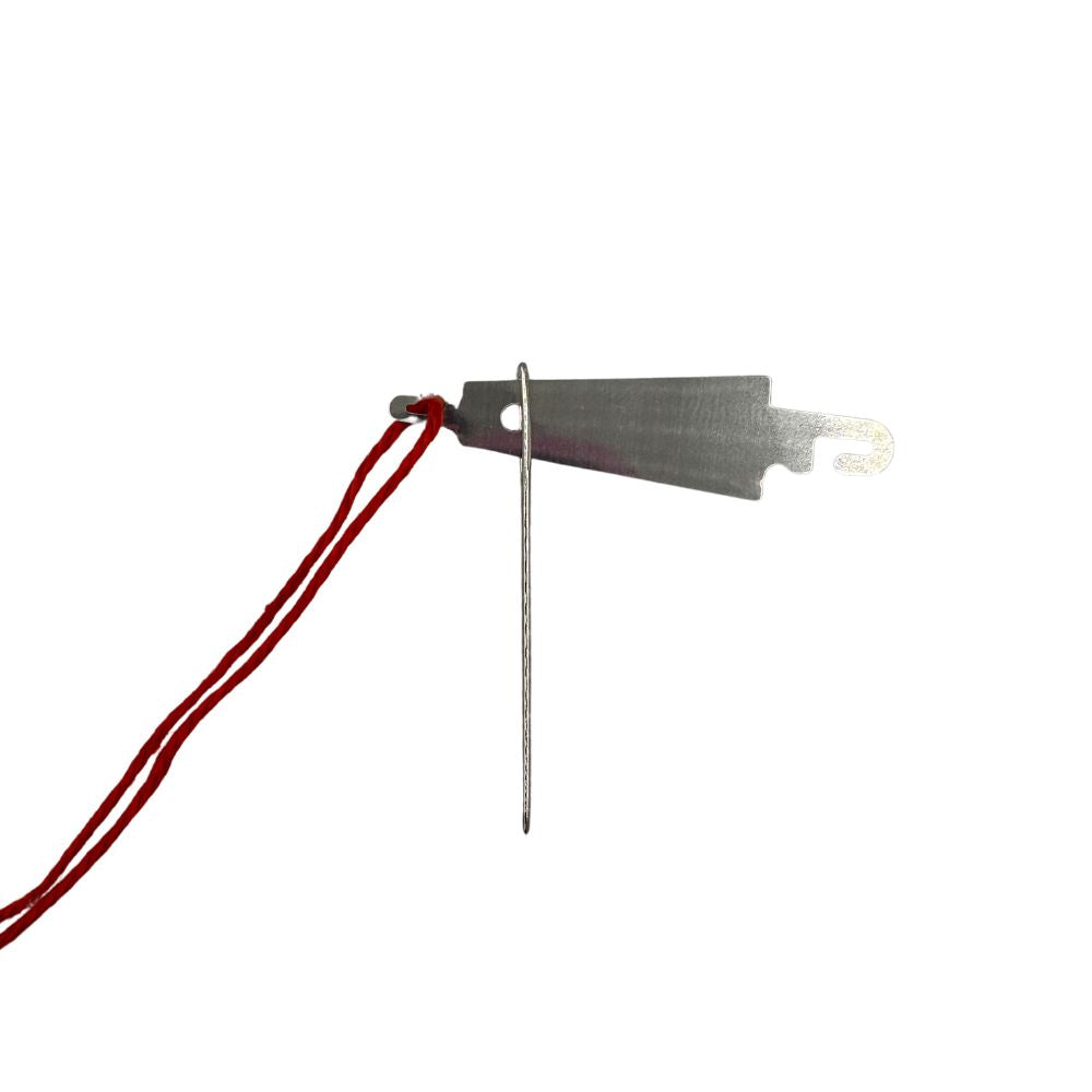 Needle threader in use