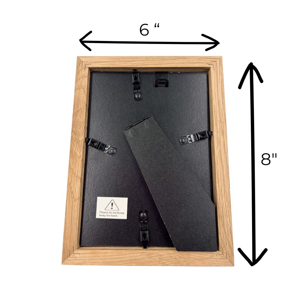 Wooden picture frame with dimensions labeled on a white background