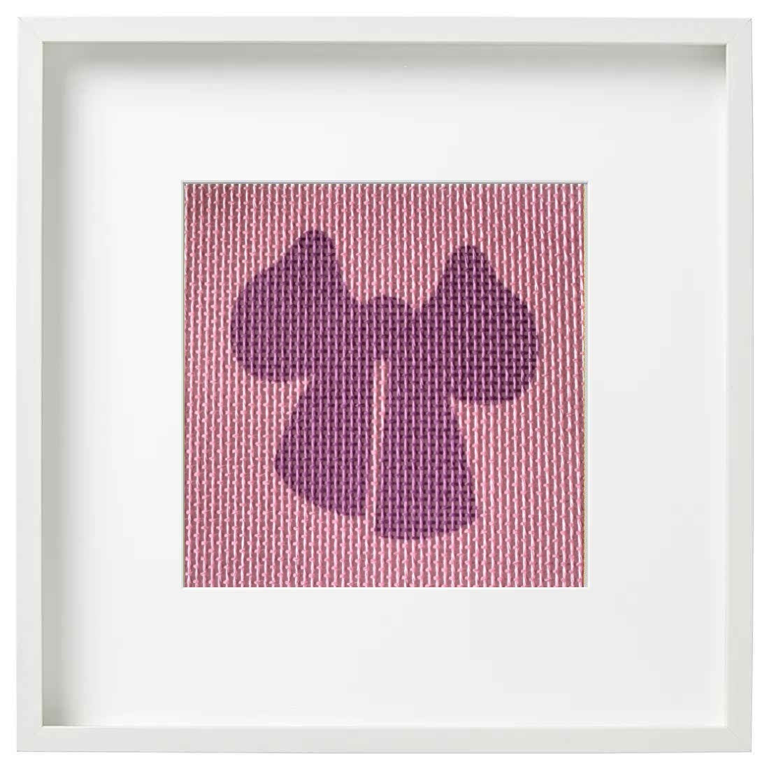 needlepoint design of a pink bow in a frame