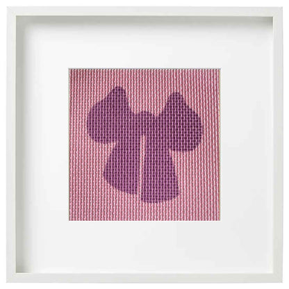 needlepoint design of a pink bow in a frame