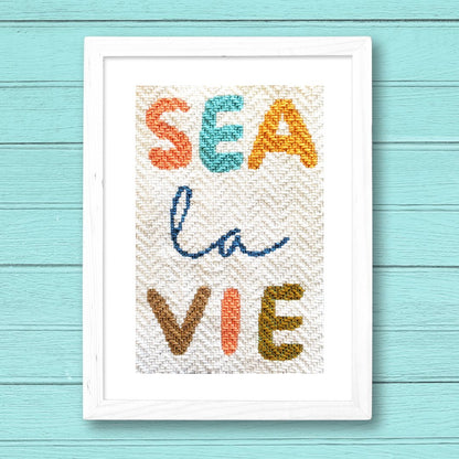 Sea La Vie needlepoint saying stitched in a decorative Wave stitch