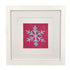 The Snowflake design stitched and in a white frame.
