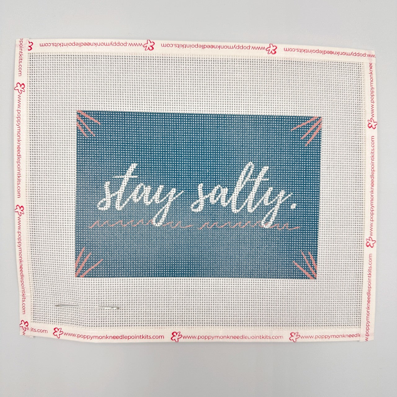 Needlepoint canvas with &