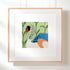 Swan needlepoint kit shown in a frame
