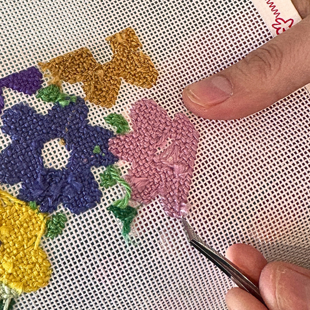 using tweezers to remove stitches