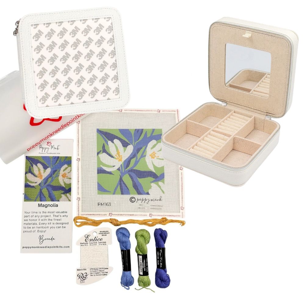 Magnolia floral needlepoint kit with a white jewelry box.