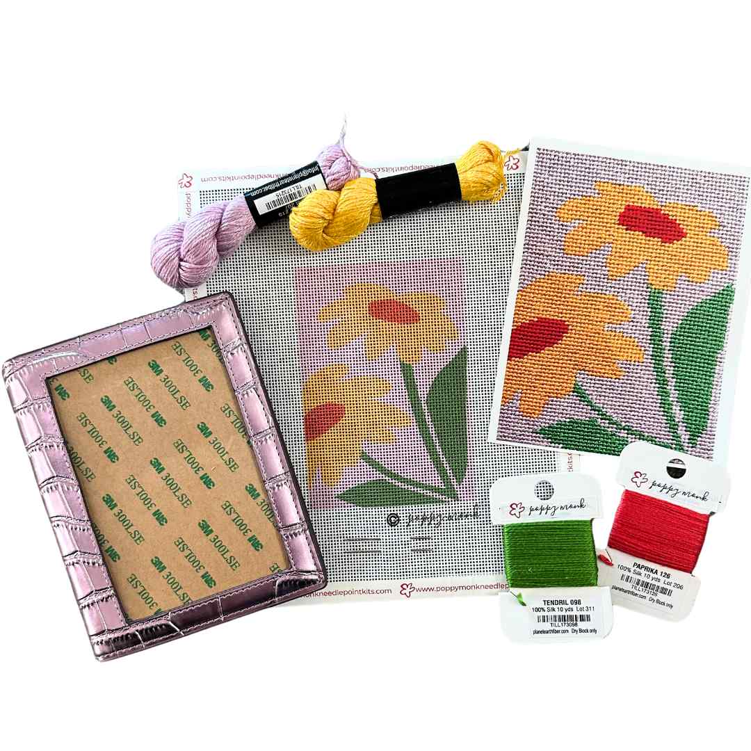 Metallic Mauve self-finishing leather passport cover by Rachel Barri with Yellow Flowers needlepoint kit.