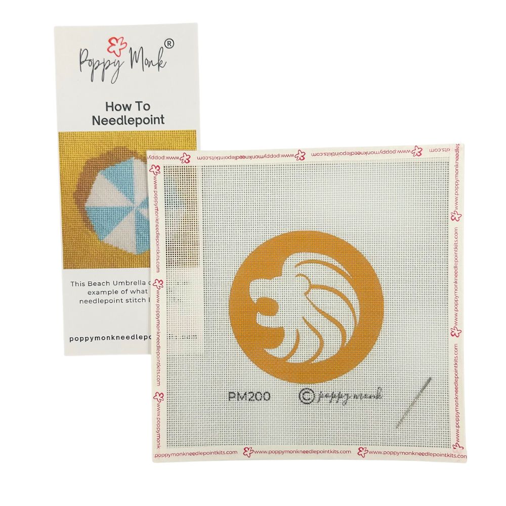 Leo lion eedlepoint kit with canvas, yarn, and instructions on a white background