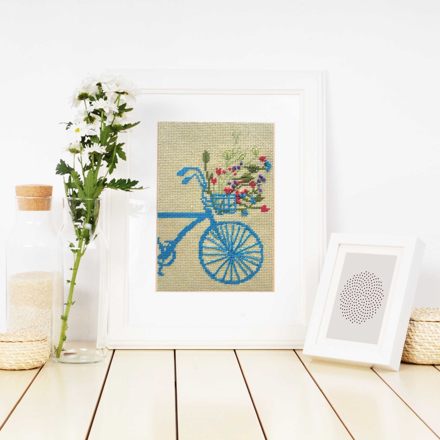 Bike and Wildflowers small needlepoint kit for adults shown in a frame