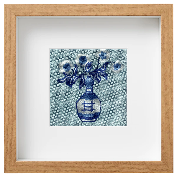 Blue and white needlepoint kit with magnolia chinoiserie vase