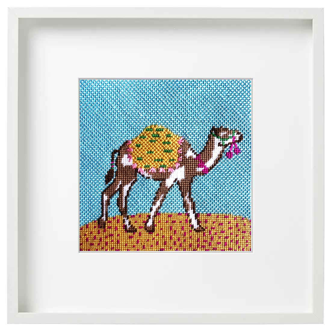 Modern camel needlepoint kit shown stitched and framed