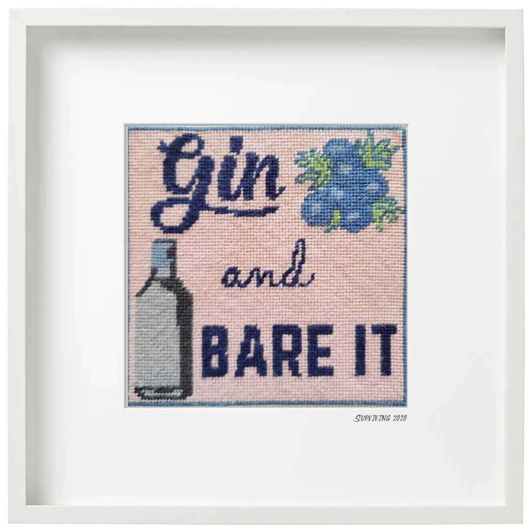 Gin and Bare It needlepoint kit with silk threads in white frame.