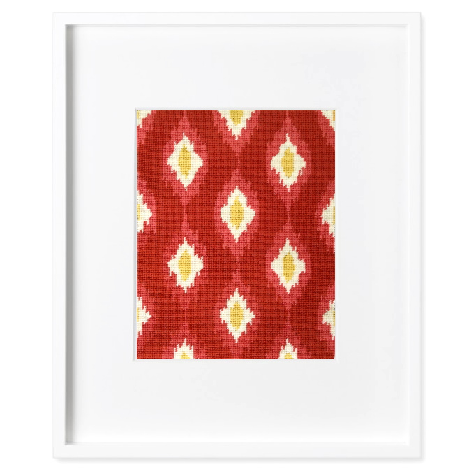 red ikat needlepoint kit in a frame.