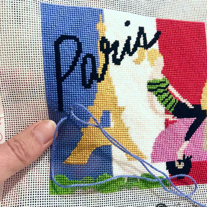 Paris needlepoint design being stitched.